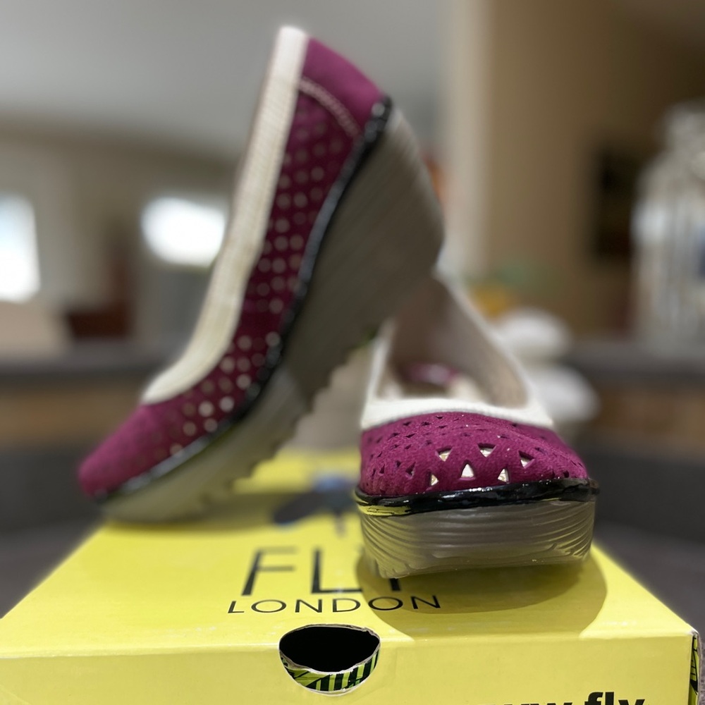 London Fly Wedge Heel Shoes
New in Box
Size 36